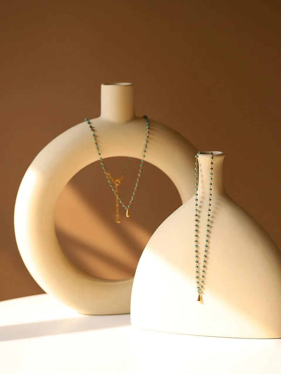 Handmade stone bead and golden drop necklace