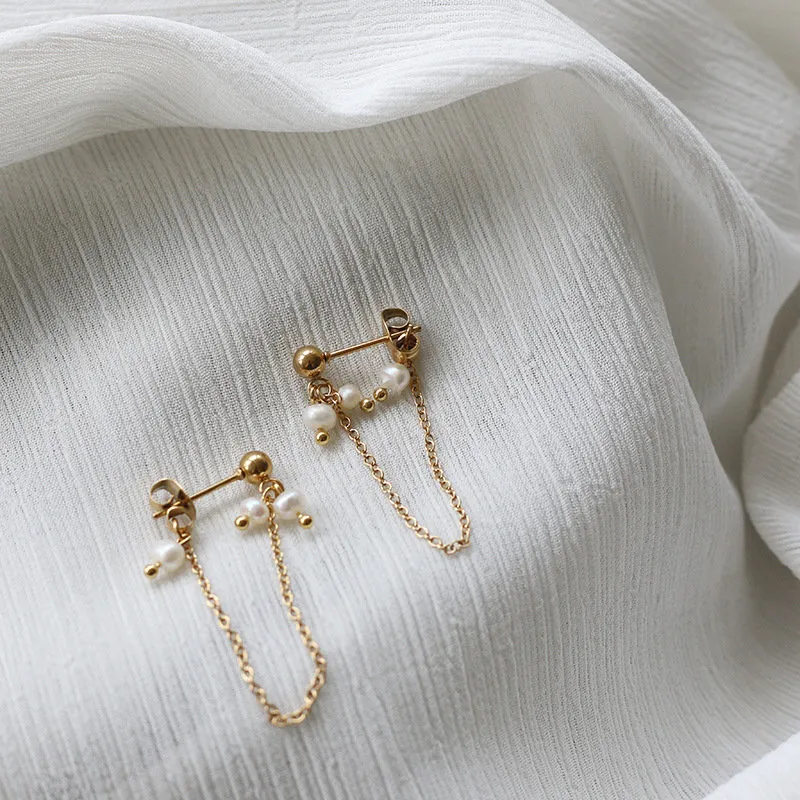 Naughty pearl fringe earrings