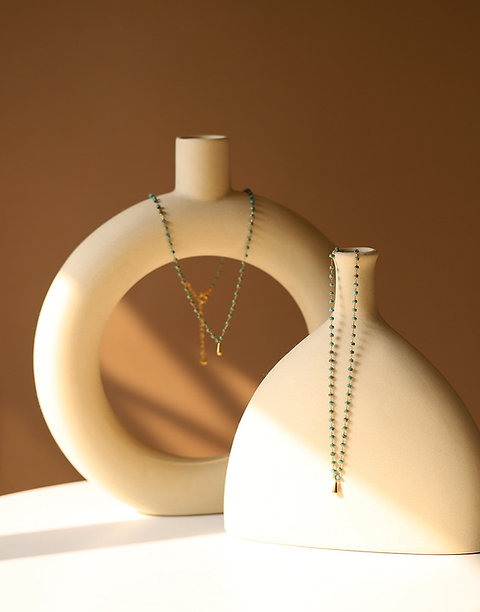 Handmade stone bead and golden drop necklace