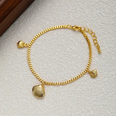 dainty shell and fish bracelet