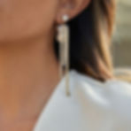 Model wearing zircon tassel movement earrings 316L stainless steel waterproof hypoallergenic jewelry